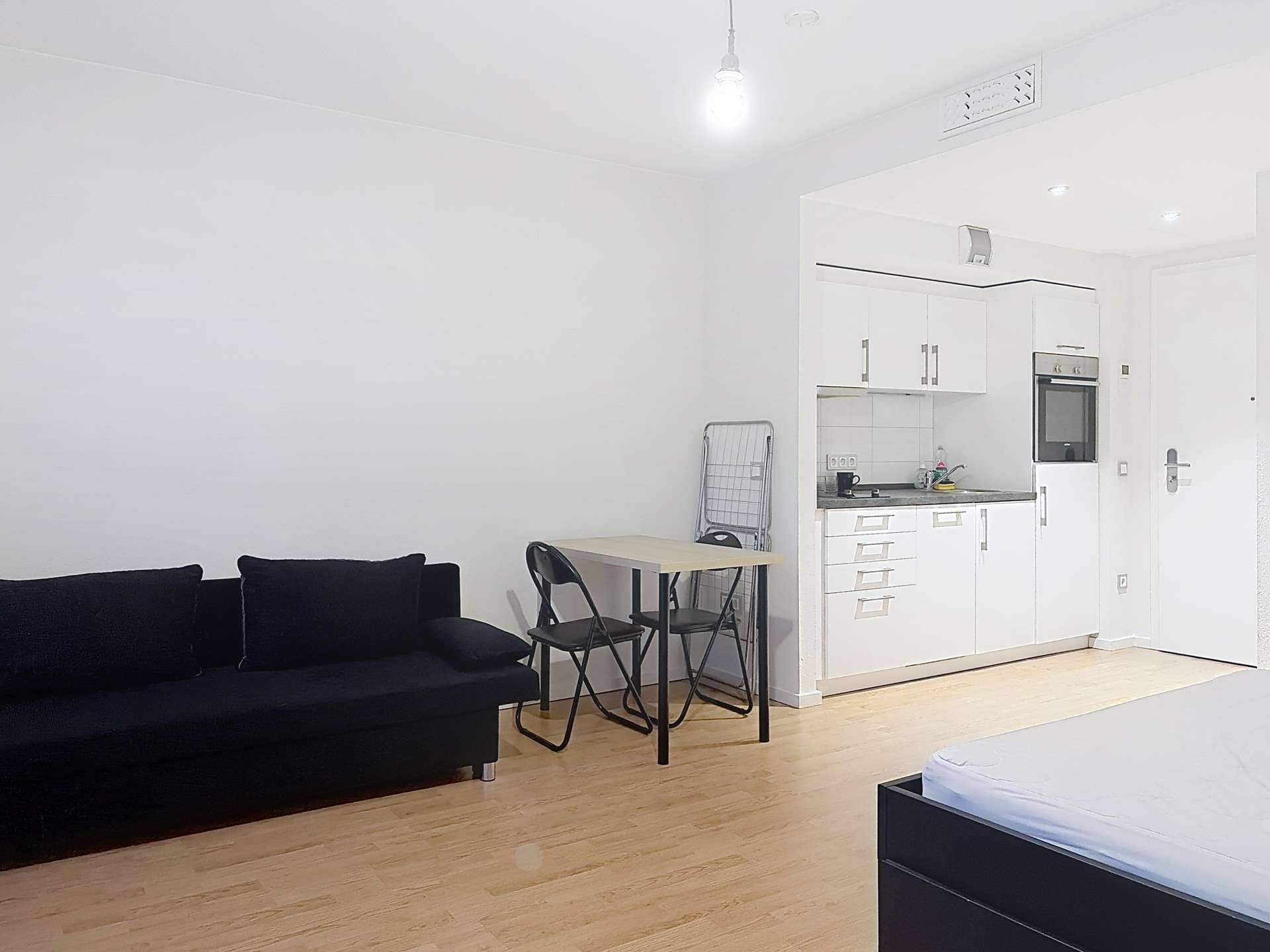 Zimmer mit Küchenzeile